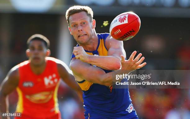 Sam Mitchell of the Eagles in action during the round 11 AFL match between the Gold Coast Suns and the West Coast Eagles at Metricon Stadium on June...