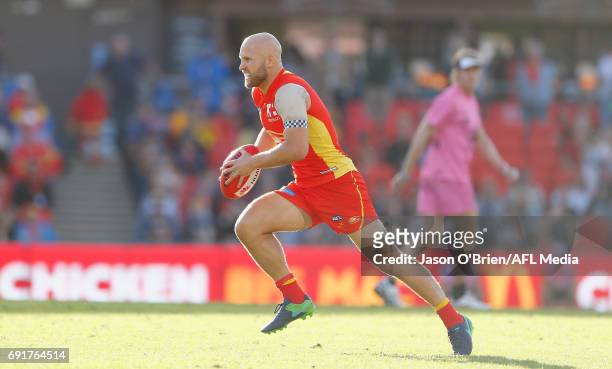 Gary Ablett of the suns in action during the round 11 AFL match between the Gold Coast Suns and the West Coast Eagles at Metricon Stadium on June 3,...