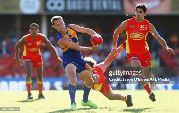 Sam Mitchell of the Eagles in action during the round 11 AFL match between the Gold Coast Suns and the West Coast Eagles at Metricon Stadium on June...