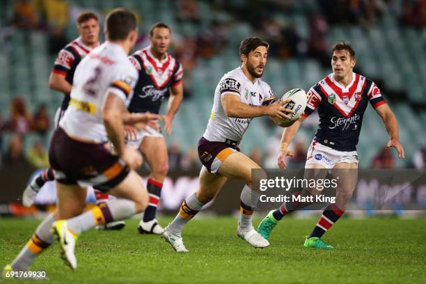 Ben Hunt of the Broncos runs with the ball during the round 13 NRL match between the Sydney Roosters and the Brisbane Broncos at Allianz Stadium on...