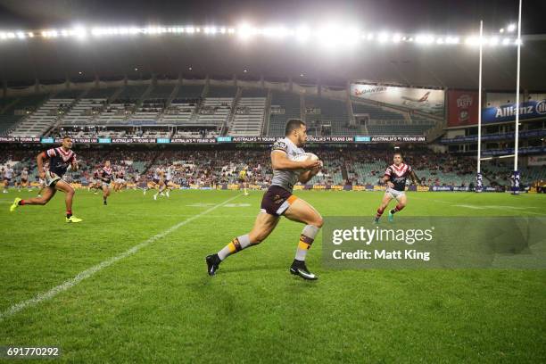 Jordan Kahu of the Broncos makes a break down the sideline during the round 13 NRL match between the Sydney Roosters and the Brisbane Broncos at...