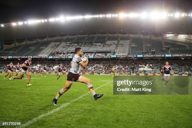 Jordan Kahu of the Broncos makes a break down the sideline during the round 13 NRL match between the Sydney Roosters and the Brisbane Broncos at...