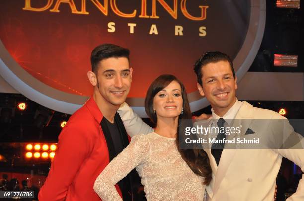 Dimitar Stefanin, Karina Sarkissova and Thomas Kraml pose during the 'Dancing Stars' finals at ORF Zentrum on June 2, 2017 in Vienna, Austria.