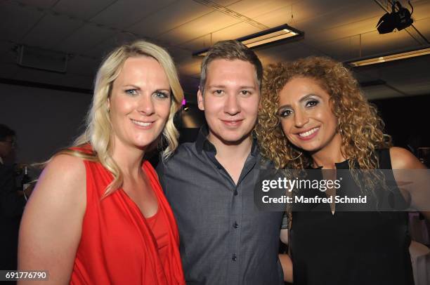 Nicole Hosp, Clemens Trischler and Eser Ari-Akbaba pose during the 'Dancing Stars' finals at ORF Zentrum on June 2, 2017 in Vienna, Austria.