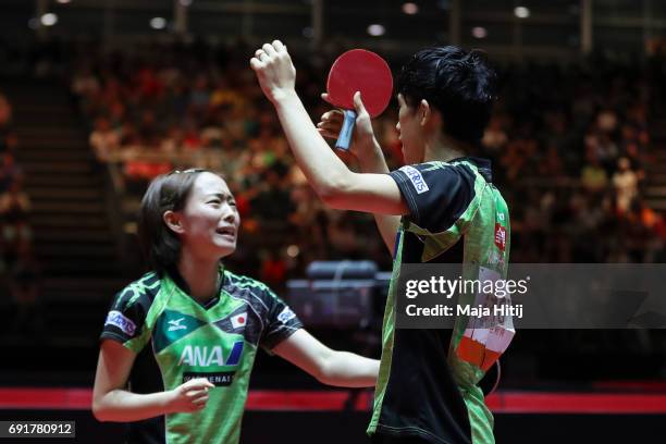Maharu Yoshimura of Japan and Kasumi Ishikawa celebrate after winning Mixed Doubles Semi Finals at Table Tennis World Championship at Messe...