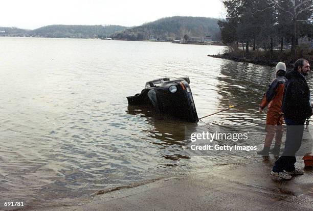 Actor Nicolas Cages 1989 Porsche Sportster is pulled from the Lake of the Ozarks, MO January 16, 2002. The $100,000 collectors item was in transport...