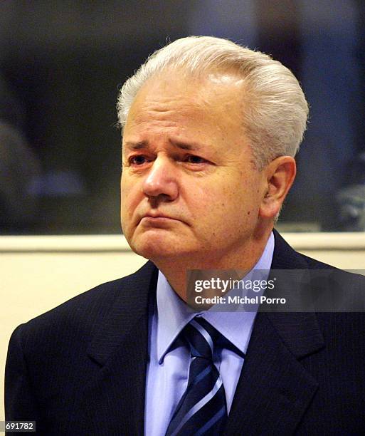 Former Yugoslav President Slobodan Milosevic appears at a pre-trial hearing before the International War Crimes Tribunal January 9, 2002 in The...
