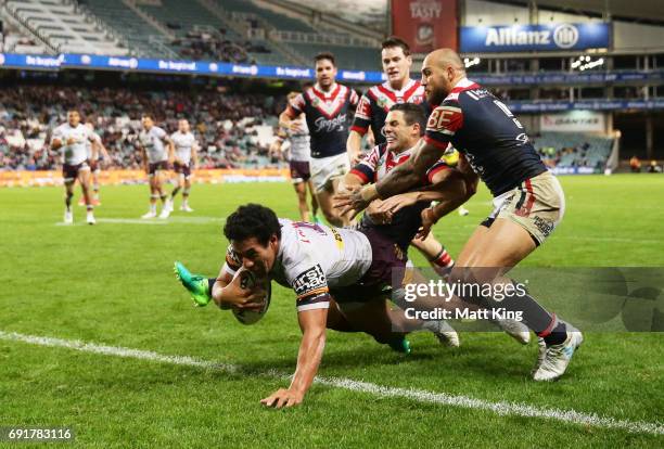 Tautau Moga of the Broncos scores the final try during the round 13 NRL match between the Sydney Roosters and the Brisbane Broncos at Allianz Stadium...