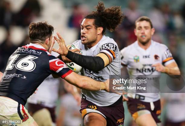 Adam Blair of the Broncos is tackled during the round 13 NRL match between the Sydney Roosters and the Brisbane Broncos at Allianz Stadium on June 3,...