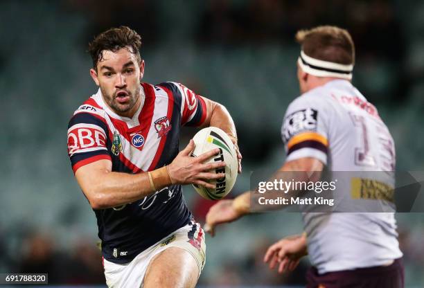 Aidan Guerra of the Roosters runs at the defence during the round 13 NRL match between the Sydney Roosters and the Brisbane Broncos at Allianz...