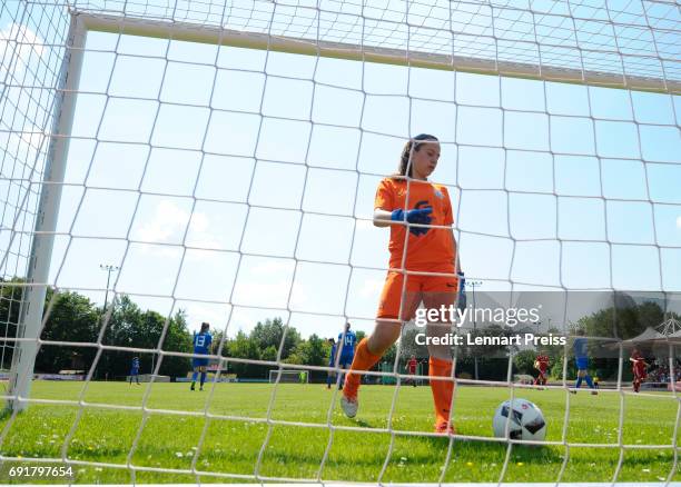 Julia Kassen of SV Meppen gets the ball out of the goal during the B Junior Girl's German Championship Semi Final First Leg match between FC Bayern...