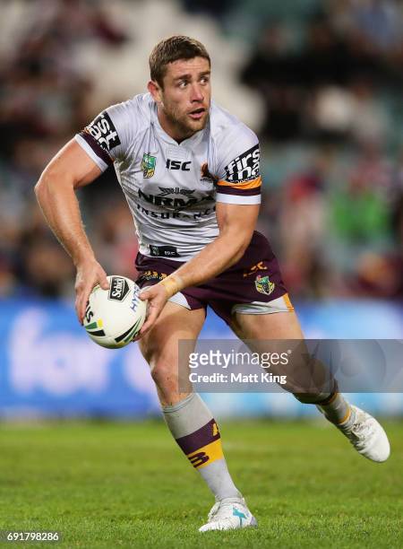Andrew McCullough of the Broncos passes during the round 13 NRL match between the Sydney Roosters and the Brisbane Broncos at Allianz Stadium on June...