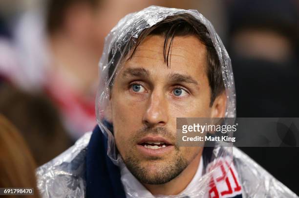 Mitchell Pearce of the Roosters looks on from the stands during the round 13 NRL match between the Sydney Roosters and the Brisbane Broncos at...