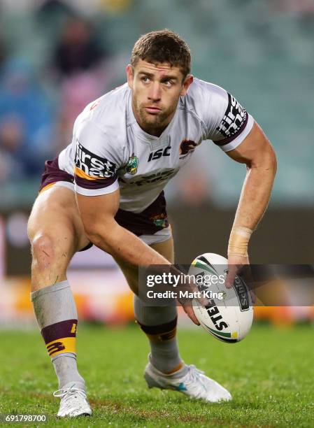 Andrew McCullough of the Broncos passes during the round 13 NRL match between the Sydney Roosters and the Brisbane Broncos at Allianz Stadium on June...