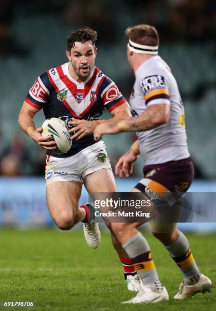 Aidan Guerra of the Roosters runs at the defence during the round 13 NRL match between the Sydney Roosters and the Brisbane Broncos at Allianz...