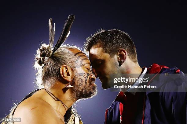 Sam Warburton of the Lions receives a hongi from a Maori Chief after winning the match between the New Zealand Provincial Barbarians and British &...