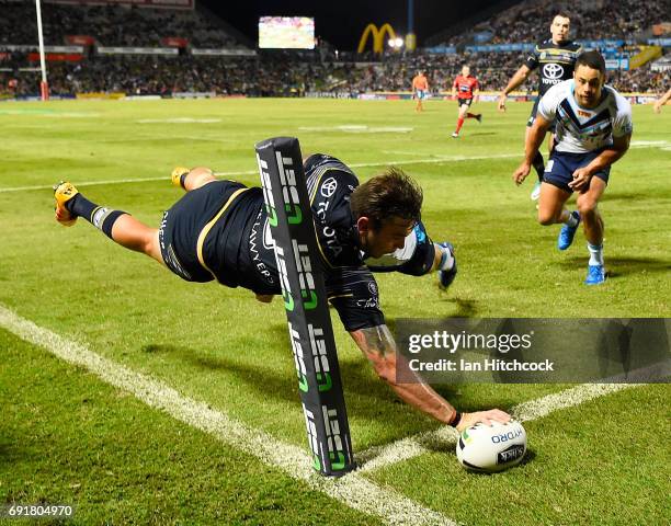 Kyle Feldt of the Cowboys scores a try during the round 13 NRL match between the North Queensland Cowboys and the Gold Coast Titans at 1300SMILES...