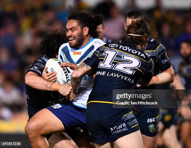 Konrad Hurrell of the Titans makes a break during the round 13 NRL match between the North Queensland Cowboys and the Gold Coast Titans at 1300SMILES...