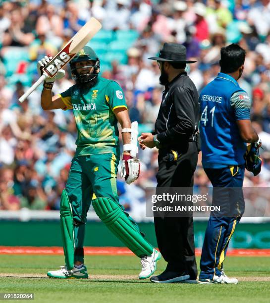 South Africas Hashim Amla acknowledges the crowd after reaching 50 runs not out during the ICC Champions Trophy, between South Africa and Sri Lanka...