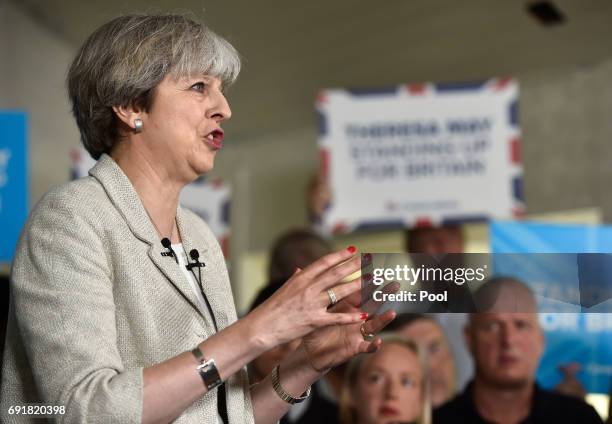 Britain's Prime Minister Theresa May speaks at an election campaign event during a visit to West Yorkshire at Thornhill Cricket and Bowling Club on...