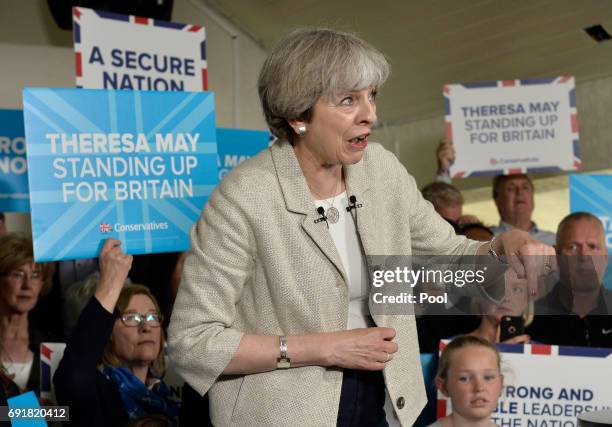 Britain's Prime Minister Theresa May speaks at an election campaign event during a visit to West Yorkshire at Thornhill Cricket and Bowling Club on...