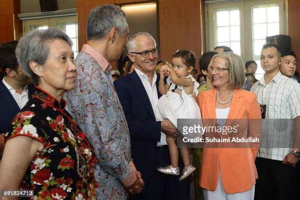 Singapore Prime Minister Lee Hsien Loong and wife Ho Ching and Australian Prime Minister Malcolm Turnbull and wife Lucy Turnbull attend the official...