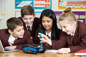 School Pupils In Science Lesson Studying Robotics