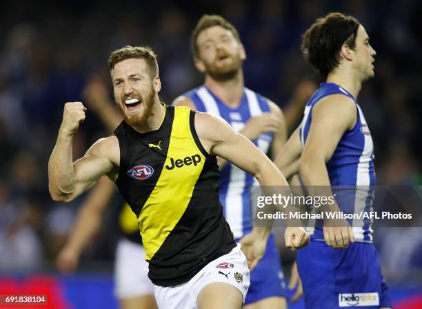 Kane Lambert of the Tigers celebrates during the 2017 AFL round 11 match between the North Melbourne Kangaroos and the Richmond Tigers at Etihad...