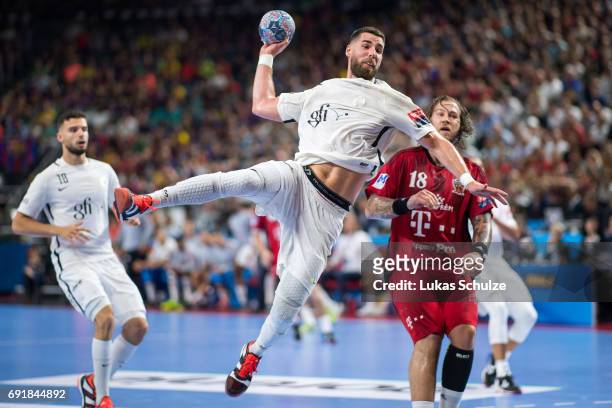 Luka Karabatic of Paris throws the ball during the VELUX EHF FINAL4 Semi Final match between Telekom Veszprem and Paris Saint-Germain Handball at...
