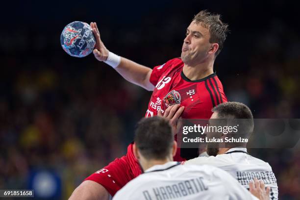Momir Ilic of Veszprem throws the ball during the VELUX EHF FINAL4 Semi Final match between Telekom Veszprem and Paris Saint-Germain Handball at...