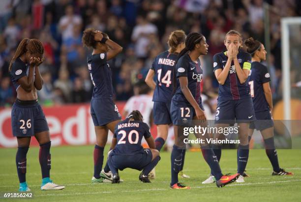 Grace Geyoro , Perle Morroni and Sabrina Delannoy of Paris Saint Germain react after losing the UEFA Women's Champions League Final between Olympique...