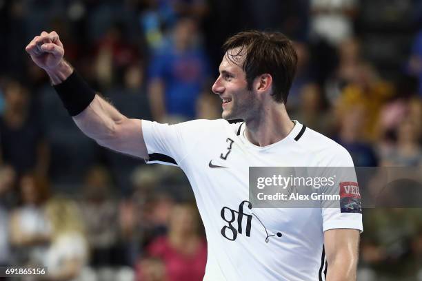 Uwe Gensheimer of Paris celebrates after the VELUX EHF FINAL4 Semi Final between Telekom Veszprem and Paris Saint-Germain Handball at Lanxess Arena...