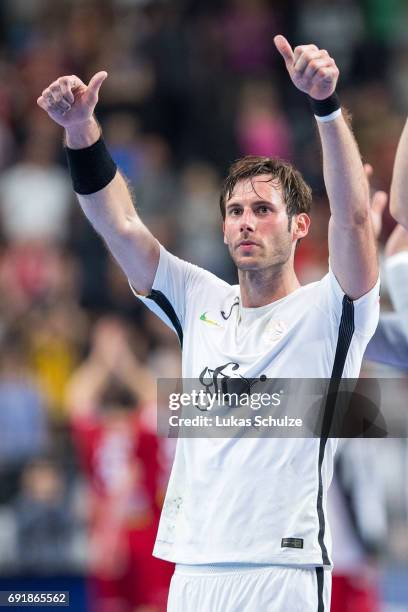 Uwe Gensheimer of Paris celebrates after win the VELUX EHF FINAL4 Semi Final match between Telekom Veszprem and Paris Saint-Germain Handball at...