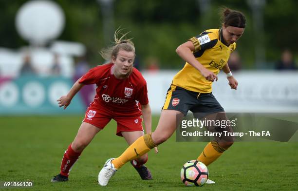 Lottie Wubbon-Moy of Arsenal Ladies is tracked by Lauren Hemp of Bristol City Women during the WSL 1 match between Bristol City Women and Arsenal...
