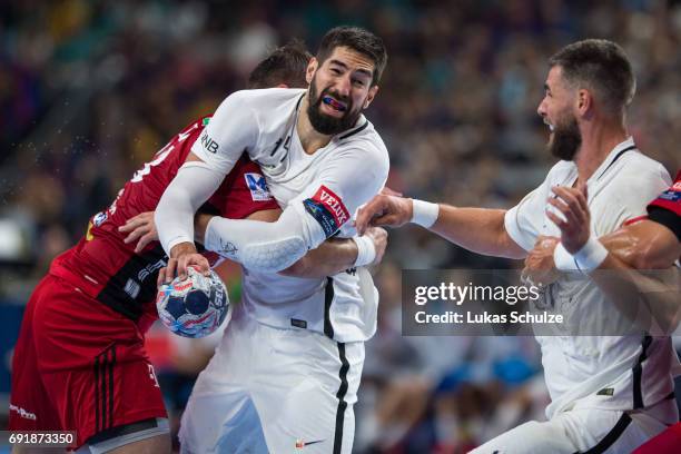 Nikola Karabatic of Paris is fighting against the defense of Veszprem during the VELUX EHF FINAL4 Semi Final match between Telekom Veszprem and Paris...