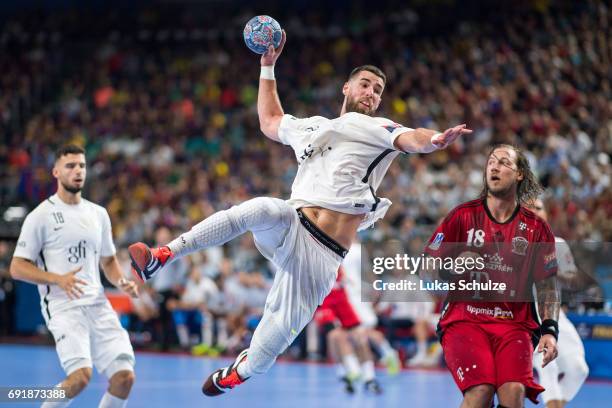 Luka Karabatic of Paris throws the ball during the VELUX EHF FINAL4 Semi Final match between Telekom Veszprem and Paris Saint-Germain Handball at...