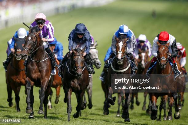 Padraig Beggy riding Wings Of Eagles win The Investec Derby from Cliffs Of Moher on Investec Derby Day at Epsom Racecourse on June 3, 2017 in Epsom,...