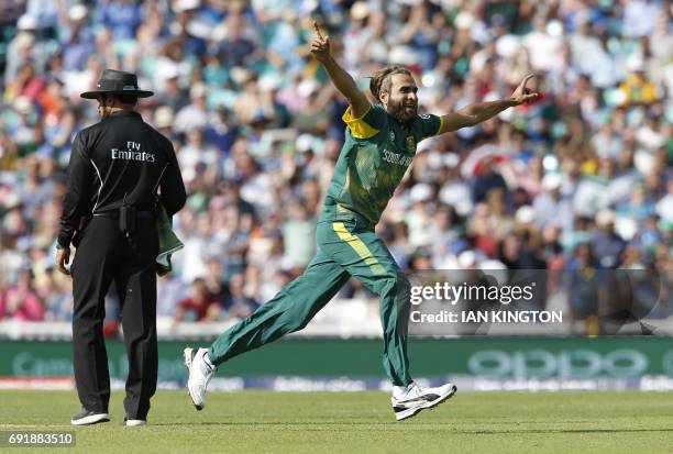 South Africas Imran Tahir celebrates taking the wicket of Sri Lankas Upul Tharanga for 57 runs during the ICC Champions Trophy match between South...