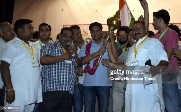 Supporters present Mace to former Delhi Minister Kapil Mishra during the launch of programme ‘India Against Corruption-2’ against Arvind Kejriwal's...