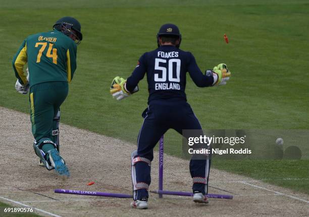 Duane Olivier of South Africa A is bowled out by Liam Dawson of England Lions during the One Day International match between England Lions and...