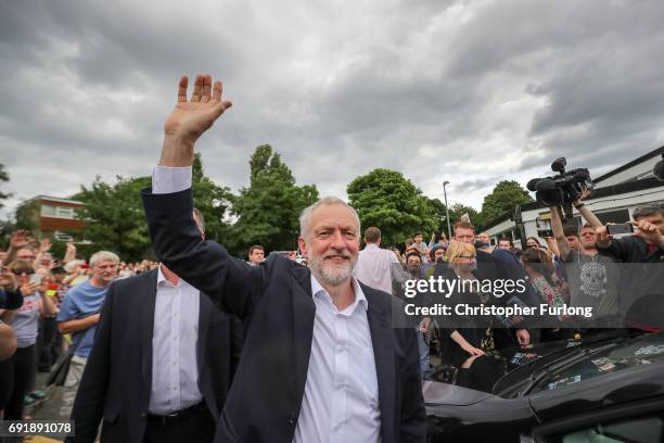 Labour leader Jeremy Corbyn waves to supporters after a rally of supporters at Beeston Youth and Community Centre he visits the East Midlands during...