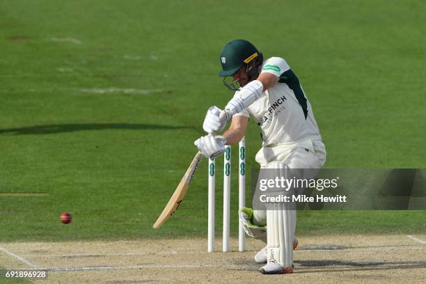 Daryl Mitchell of Worcestershire drives a ball from Vernon Philander to the boundary during the second day of the Specsavers County Championship...