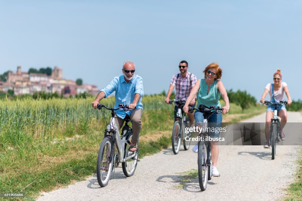 Family holidays in Langhe region, Piedmont, Italy: Electric bikes trip in the hills