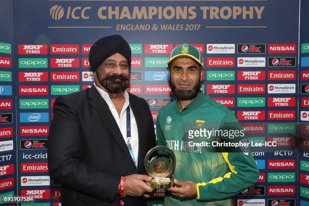 Malik of OPPO presents Imran Tahir of South Africa with his Man of the Match award during the ICC Champions Trophy Group B match between Sri Lanka...