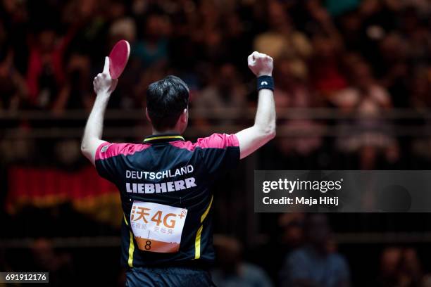 Timo Boll of Germany celebrates after winning Men's eight-final at Table Tennis World Championship at Messe Duesseldorf on June 3, 2017 in...