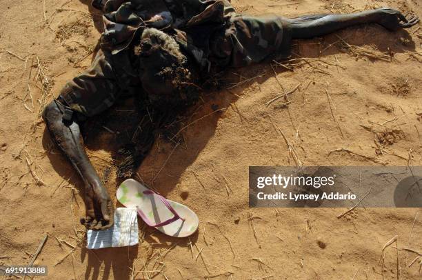 Dead Sudanese government soldier lies in a former temporary military camp for the GOS, which was attacked by the NRF on October 7 near the Darfur...