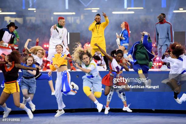 Will.i.am, apl.de.ap and Taboo of The Black Eyed Peas perform prior to the UEFA Champions League Final between Juventus and Real Madrid at National...