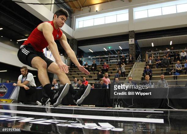 Tyler Inamoto performs the Long Jump during the NHL Combine at HarborCenter on June 3, 2017 in Buffalo, New York.