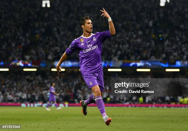 Cristiano Ronaldo of Real Madrid celebrates scoring his sides first goal during the UEFA Champions League Final between Juventus and Real Madrid at...