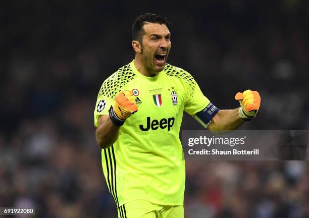 Gianluigi Buffon of Juventus celebrates his sides first goal during the UEFA Champions League Final between Juventus and Real Madrid at National...